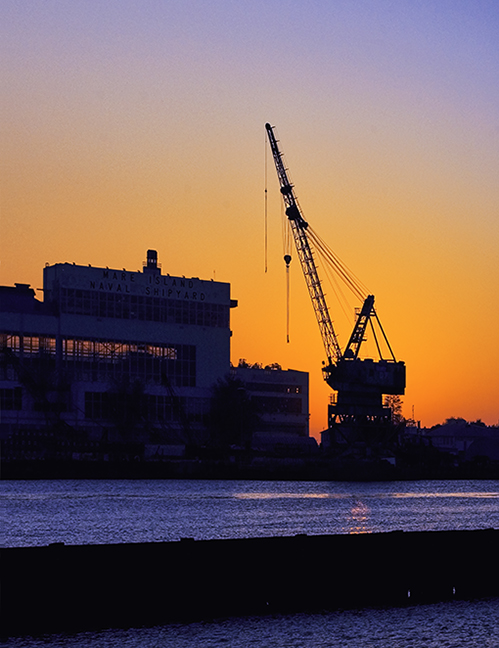 Sunset with crane at periscope shop